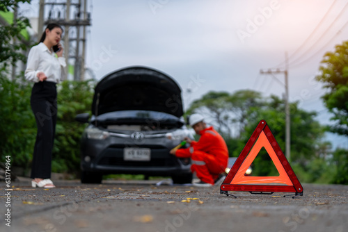 Traffic accident, insurance agent inspects damaged vehicles and submits a post-accident claim report, insurance concept