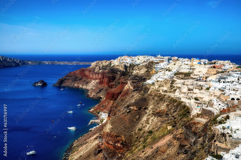 The Rocky Headland with the Beautiful Village of Oia on Santorini, Greece