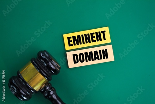 judge's gavel and colored paper with the words Eminent Domain