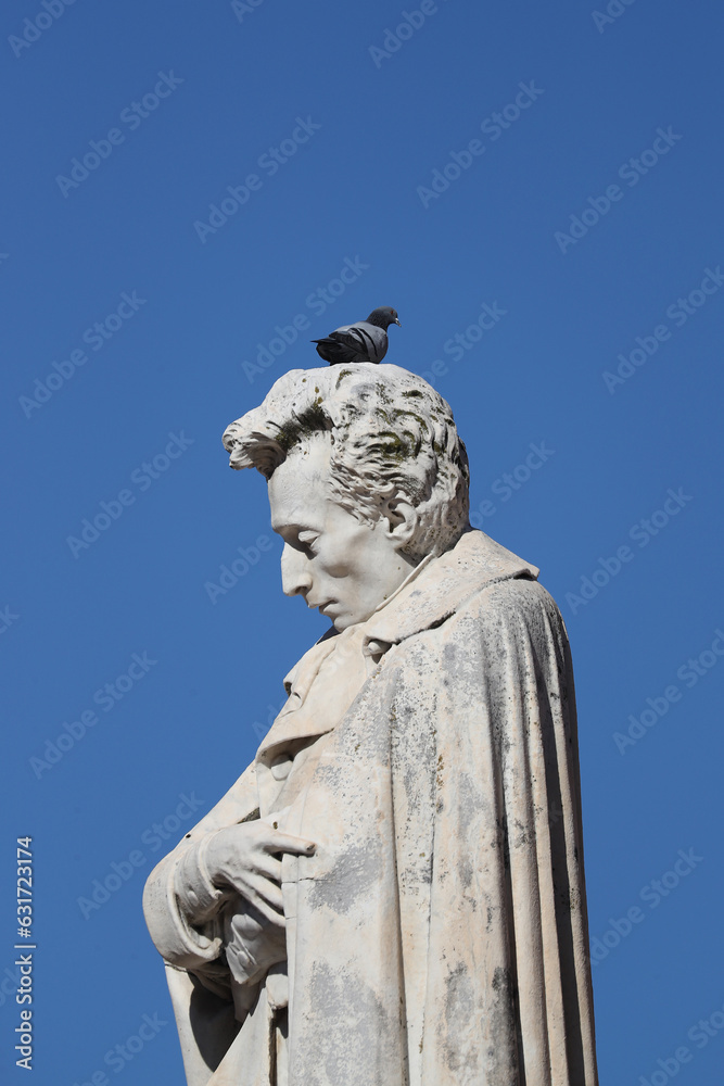 Statue of Giacomo Leopardi in the main square in the town of Recanati in the Marche region of Italy. He was one of Italy's most important poets.