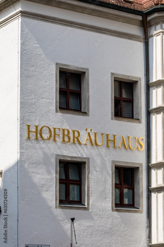 Hofbrauhaus sign on white walls of building Hofbrauhaus sign on white walls of building
