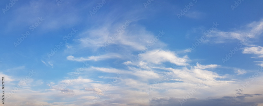 Bright blue sky with white cloud background. Panoramic heaven banner