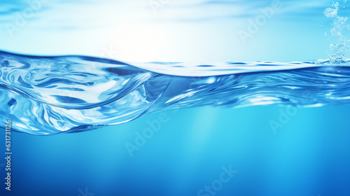Water surface texture with bubbles and splashes that is defocused blurring transparent blue in color. Trendy abstract background of nature.the ripples of water on a blue background.