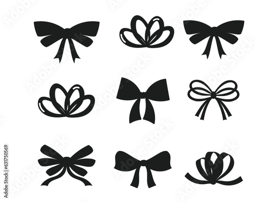 Black Silhouette of bow flat ribbons for birthday greeting cards and invitations isolated on white. © Design Stock