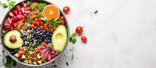 A vegan poke bowl that is tasty and colorful, placed on a light gray background. It is a fresh and healthy recipe, displayed from a top view with copy space.