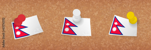 Nepal flag pinned in cork board, three versions of Nepal flag.