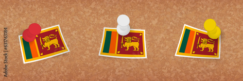 Sri Lanka flag pinned in cork board, three versions of Sri Lanka flag.