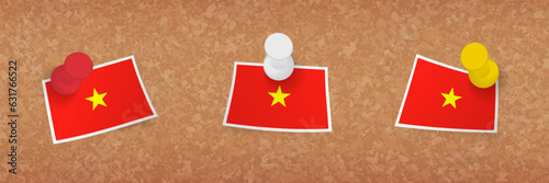 Vietnam flag pinned in cork board, three versions of Vietnam flag.