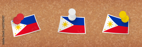 Philippines flag pinned in cork board, three versions of Philippines flag.