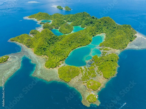Aerial survey of lagoons in Tinago Island. Beautiful beach with turquoise water. Surigao del Norte, Mindanao, Philippines.