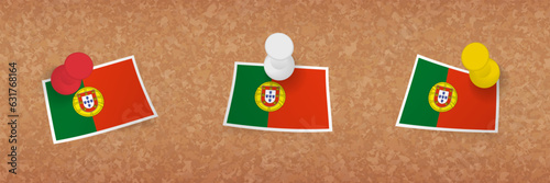 Portugal flag pinned in cork board, three versions of Portugal flag.