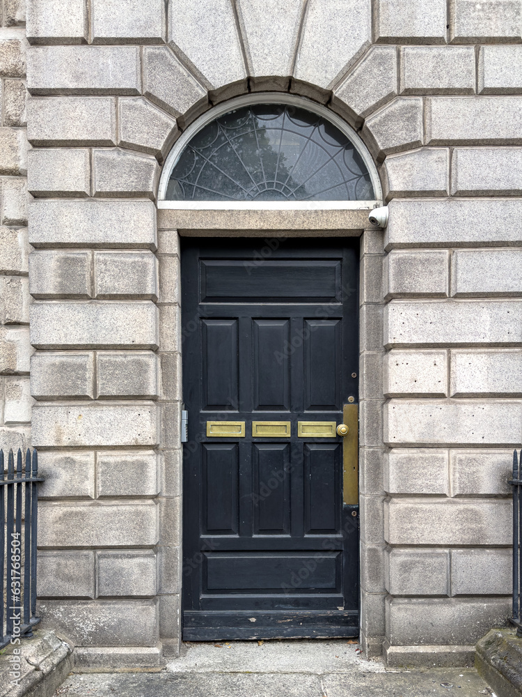A famous black painted Georgian door in Dublin, Ireland A famous black painted Georgian door in Dublin, Ireland