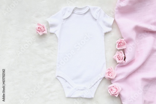 Layout Flat Lay white baby shirt bodysuit, on a pink accessory , for girls. Mock up for design and placement of logos, advertisements