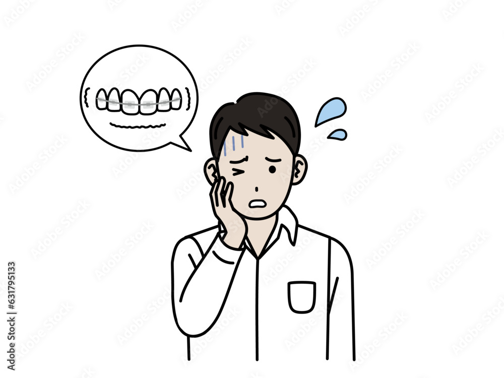 ワイヤー矯正で歯が痛む若い男性