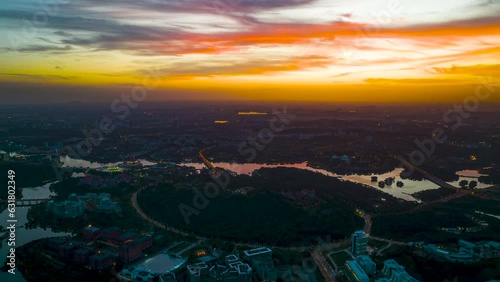 Aerial Timelapse of The Putrajaya Roundabout during sunset. The largest roundabout in the world, measures 3.4km in circumference and is joined by 15 entry and exit points photo