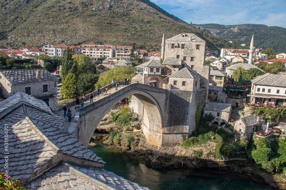 View of Stari Most (old bridge) in Mostar Village with Neretva River, Bosnia Herzegovina, 16th-century Ottoman bridge in the city of Mostar in Bosnia and Herzegovina that crosses the river Neretva 