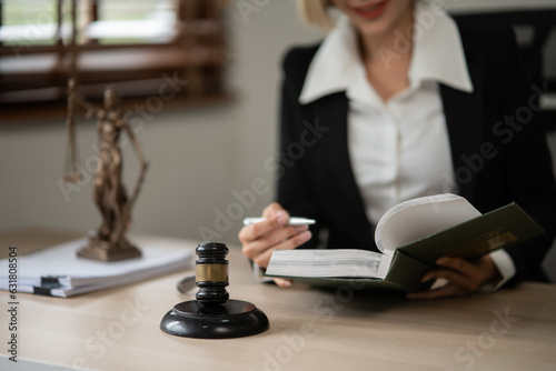 Lawyers Asiawoman   having through online Concepts  of Legal services at the law office. photo