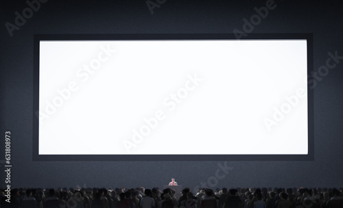 A large monitor broadcasts propaganda to a crowd of people against a dark background. 3d illustration