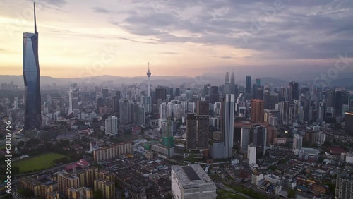 Kuala Lumpur city center with DJI Mavic Drone on beautiful Sunset: 
Petronas Twin Towers, Menara, Warisan, Merdeka skyline panorama, capital of Malaysia photo