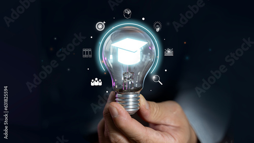 Education and E-learning concept, Webinar online, Hand of man holding lightbulb showing graduation hat, Education icons.