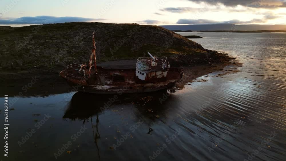 Icelandic shipwreck beached at the coast. Filmed using drone at sunrise Icelandic shipwreck beached at the coast. Filmed using drone at sunrise