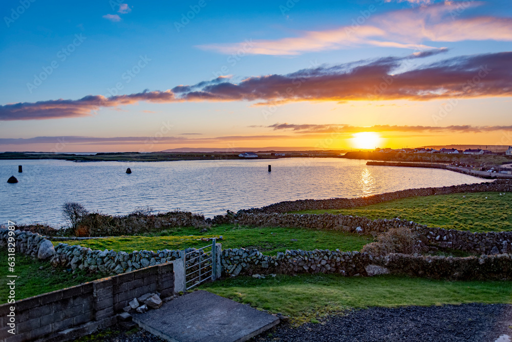 Stunning sunrise over the ocean on Inishmore island, Galway, Ireland Stunning sunrise over the ocean on Inishmore island, Galway, Ireland