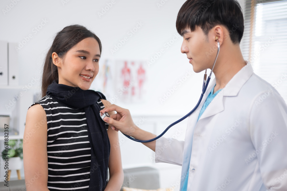 Asian young Doctor talking to woman patient at the clinic or hospital. Asian young Doctor talking to woman patient at the clinic or hospital.