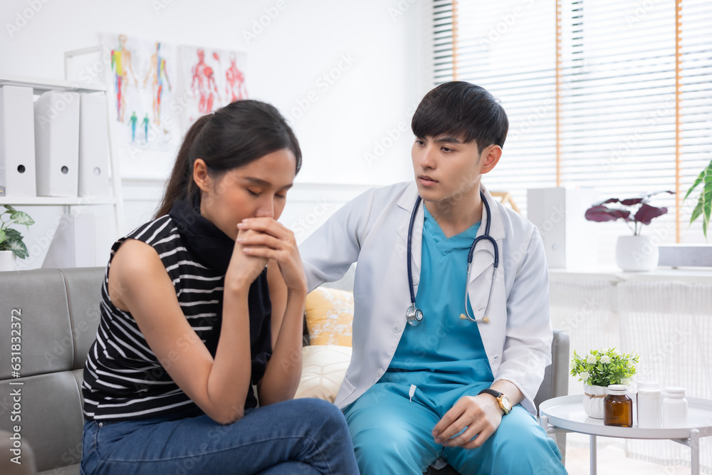 Asian young Doctor talking to woman patient at the clinic or hospital. Asian young Doctor talking to woman patient at the clinic or hospital.