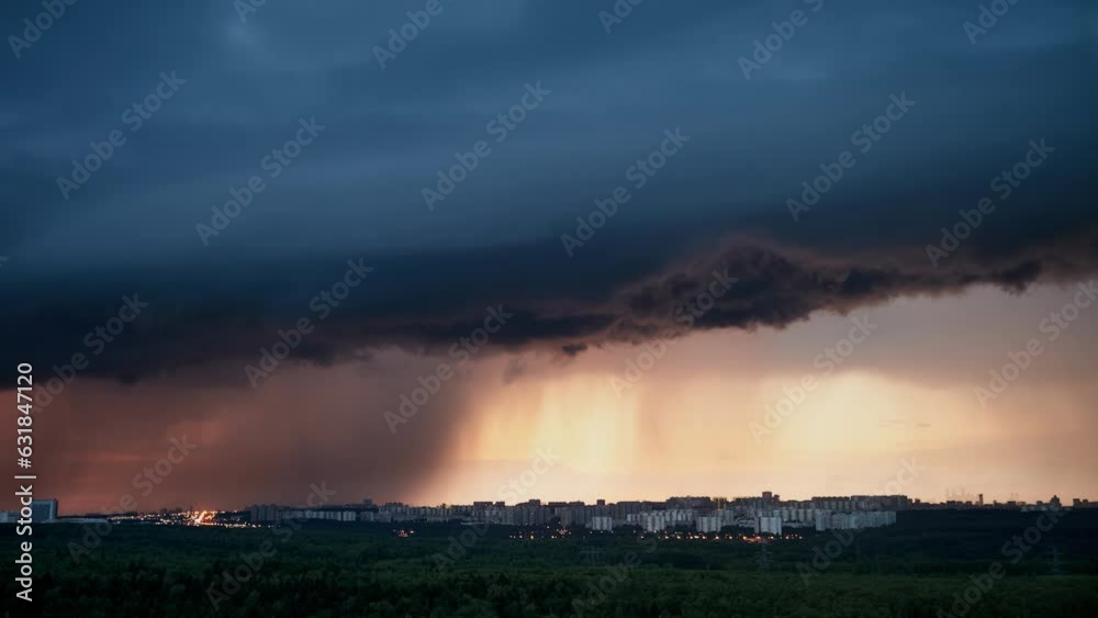 The dramatic cloudscape during the evening sky foretells rain and a lightning storm approaching, time lapse The dramatic cloudscape during the evening sky foretells rain and a lightning storm approaching, time lapse