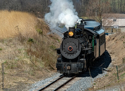 Train traveling along railroad tracks