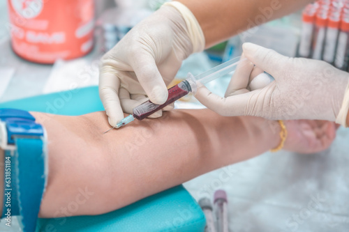 Wallpaper Mural Close up hand of nurse, taking blood sample from a patient in the hospital Torontodigital.ca