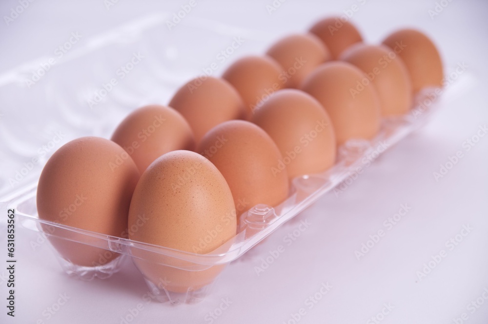 Closeup of a package of eggs on a white background Closeup of a package of eggs on a white background