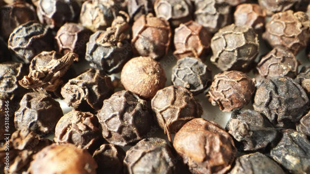 Exploring black pepper through a probe lens reveals its tiny, potent spheres. These peppercorns, plucked from vines, impart rich warmth and depth to cuisines worldwide.
