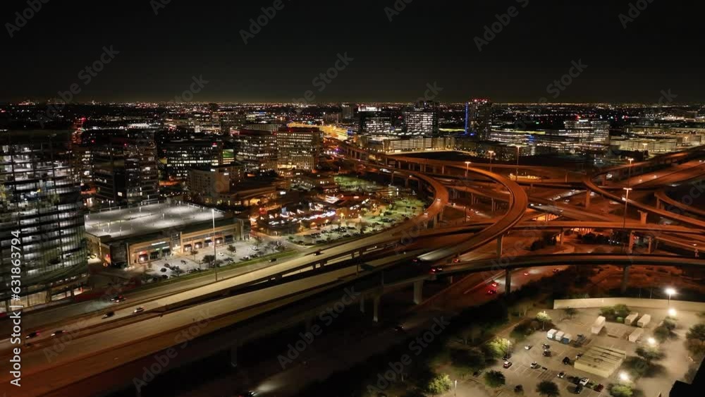Aerial shot of multi level roads in the city at night.