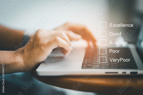 customer service evaluation and feedback rating. costumer review feedback icon, man using computer chooses happy smiling face. costumer reviews concept.
