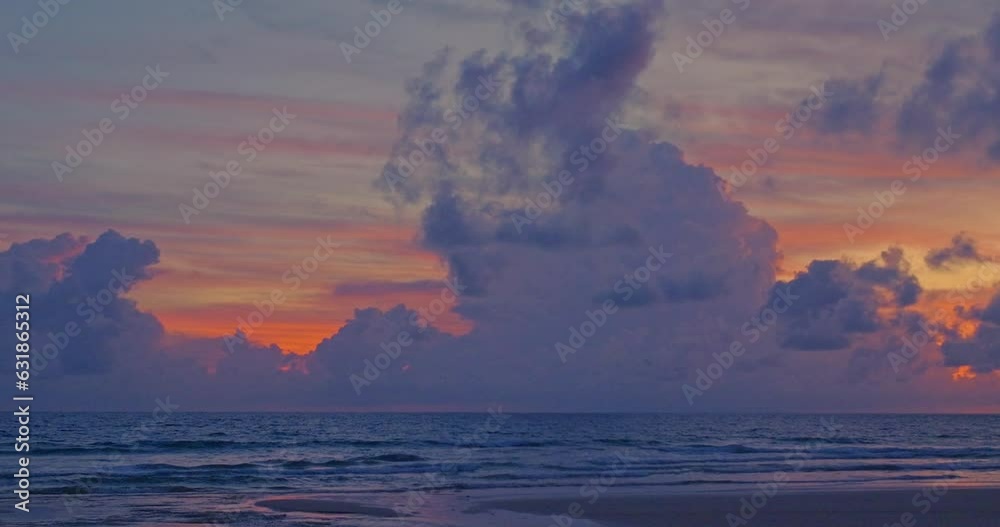 .aerial view The bright light illuminated the clouds drifting in the sky. .Magical clouds formed spirals in colorful sunset..colorful clouds spinning around in a mesmerizing dance.