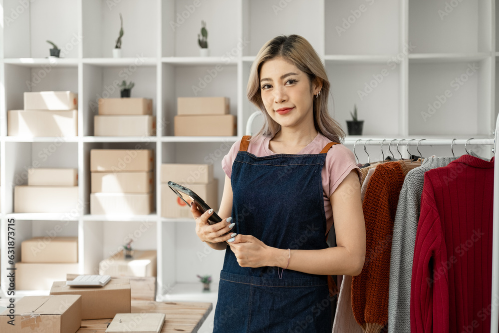 Young happy female woman lady fashion blogger business owner sale showing check clothes for present and sell in livestream live online internet shop Young happy female woman lady fashion blogger business owner sale showing check clothes for present and sell in livestream live online internet shop