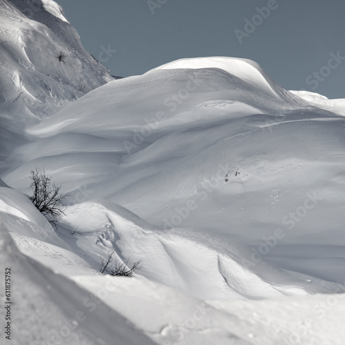 Snow covered mountains with fresh snow in Tyrol in Austria. Skiing in backcountry powder snow. 
