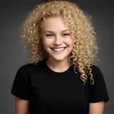 smiling blonde-haired girl in front of a dark background, portrait, curly and fluffy hair