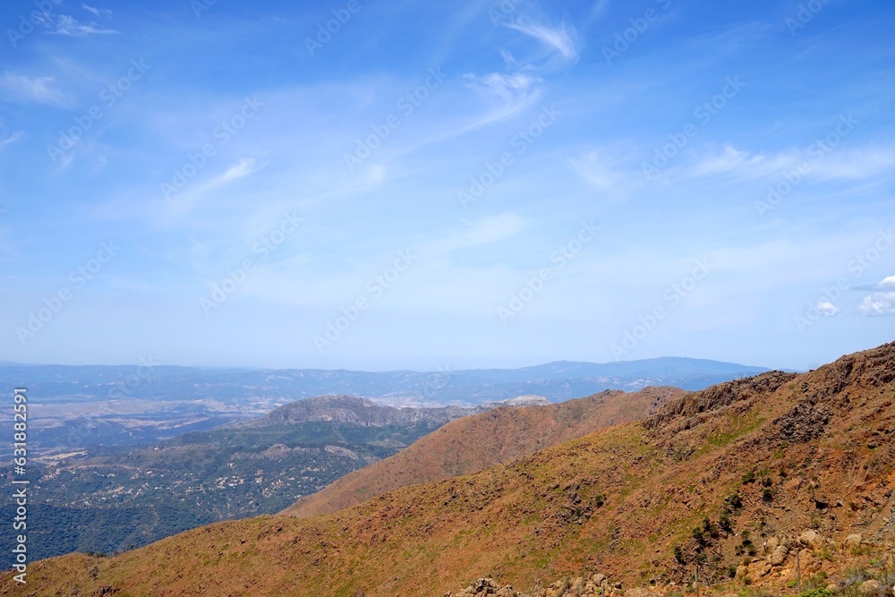 view from the Pico de Los Reales over the Andalusian landscape and the Natural Los Reales de Sierra Bermeja, Andalusia, Malaga, Spain