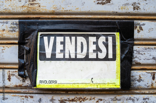 Fototapeta Naklejka Na Ścianę i Meble -  Italian sign: vendesi. English translation: For sale. Selling of real estate. Rivolgersi - english translation: call on