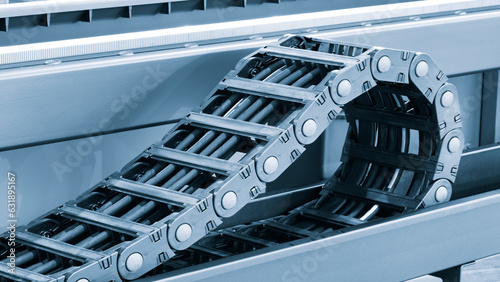 Metal Industrial flexible drag chain accessories of machine for protect wire and cable on table, industrial machinery concept