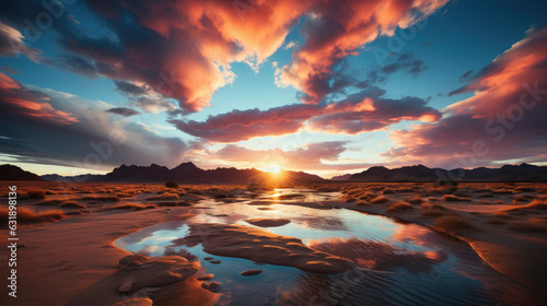 Desert landscape at sunset, under vibrant colored sky