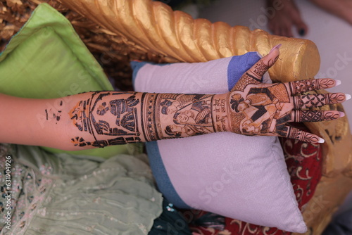 Very beautiful black mehndi done on bride's hands