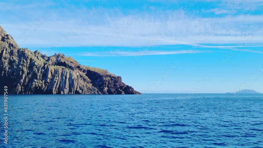 View of uninhabited islands from a passing boat View of uninhabited islands from a passing boat
