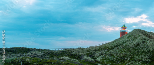 Panorama with lighthouse and marram grass on Sylt island, Germany
