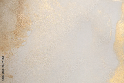 Watercolor paper texture painting wall. Abstract gold, nacre and beige marble copy space background. © Liliia