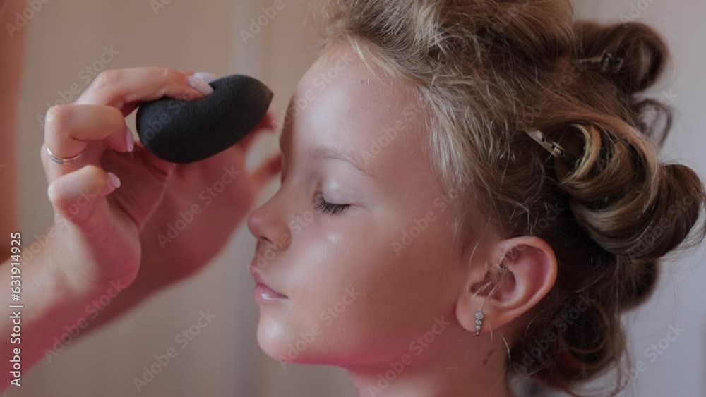 A make-up artist does professional makeup for a little girl, makes up before an event, the life of a celebrity or blogger,model A make-up artist does professional makeup for a little girl, makes up before an event, the life of a celebrity or blogger,model