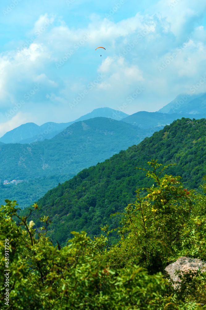 beautiful mountains, summer landscape, clouds, forest on the hillsides