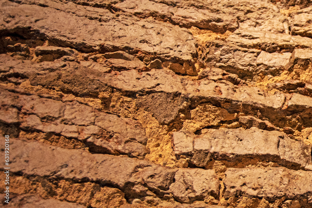 brown natural background of old brickwork walls of the middle ages. Finishing modern materials